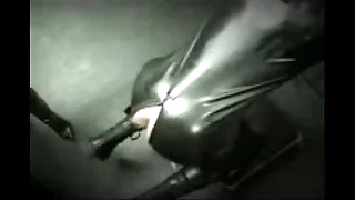 dominatrix in full latex birching